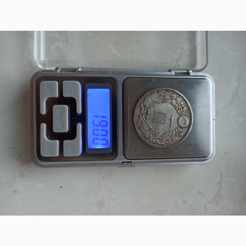 Фото 4. Продаю монету 1 єна 1986 рік срібло